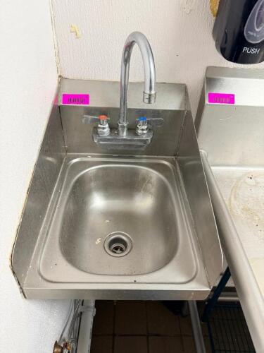 WALL MOUNT STAINLESS STEEL HAND SINK WITH INTEGRATED SIDE SPLASH GUARDS, GOOSENECK FAUCET, AND DUAL CONTROL HANDLES.