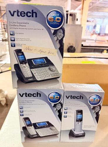 (2) VTECH 2 LINE CORDLESS PHONE AND (1) ACCESSORY HANDSET