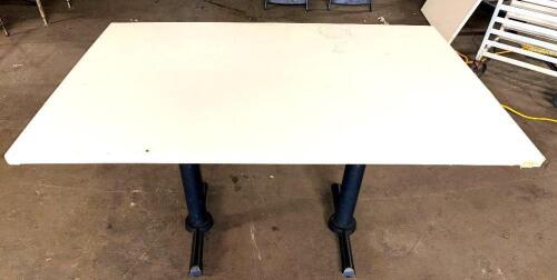 (2) 52" X 36" DOUBLE PEDESTAL TABLES W/ WHITE COVERING.