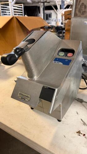 ELECTROLUX DITO COMMERCIAL FOOD PROCESSOR WITH TOP FEED CHUTE, PUSH HANDLE, AND DUAL CONTROL BUTTONS.