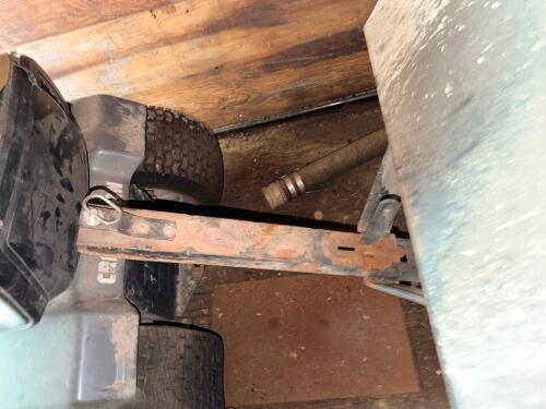 METAL TOW BEHIND LAWN CART.
