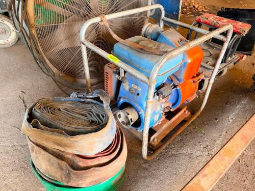 GAS POWERED TRASH PUMP W/ (2) HOSES.
