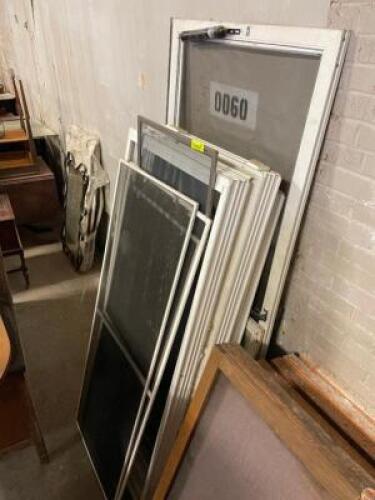 LARGE GROUP OF WINDOW SCREENS AND DOOR SCREENS