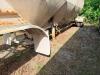 FRUEHAUF PNEUMATIC DRY BULK TANK TRAILER WITH ALUMINUM TANK, MULTIPLE HOPPER BOTTOM DISCHARGE, REAR AIR CONTROLS, AND DUAL AXLE CONFIGURATION. UNIT SHOWS HEAVY RUST ON FRAME AND COMPONENTS, WEATHERING, AND OVERALL AGE-RELATED WEAR. INCLUDES LADDER ACCESS, - 5