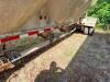 FRUEHAUF PNEUMATIC DRY BULK TANK TRAILER WITH ALUMINUM TANK, MULTIPLE HOPPER BOTTOM DISCHARGE, REAR AIR CONTROLS, AND DUAL AXLE CONFIGURATION. UNIT SHOWS HEAVY RUST ON FRAME AND COMPONENTS, WEATHERING, AND OVERALL AGE-RELATED WEAR. INCLUDES LADDER ACCESS, - 7