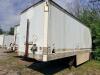 24' DRY VAN TRAILER BODY WITH ROLL-UP REAR DOOR, WOOD INTERIOR WALLS, WOOD FLOORING, AND STEEL FRAME CONSTRUCTION. UNIT SHOWS HEAVY WEAR INCLUDING RUST, CORROSION, SIDE PANEL DAMAGE, AND WEATHERING. REAR LIGHTING PRESENT, SINGLE AXLE CONFIGURATION, AND EX