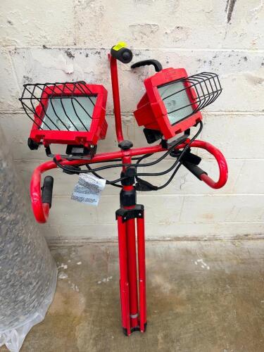 DUAL HEAD HALOGEN WORK LIGHT WITH ADJUSTABLE TRIPOD STAND, METAL HOUSINGS WITH PROTECTIVE GRILLS, AND POWER CORD