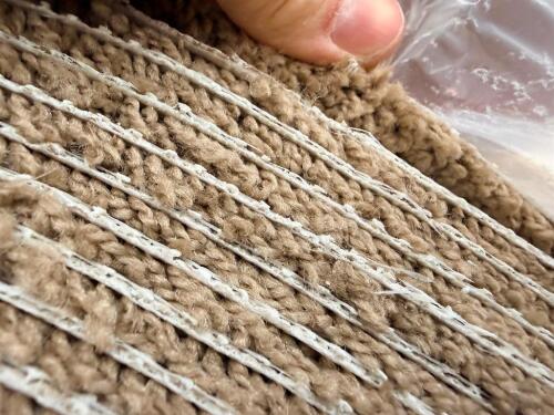 12' ROLL OF CARPET FLOORING, BEIGE LOOP PILE, BACKING WITH ADHESIVE RESIDUE