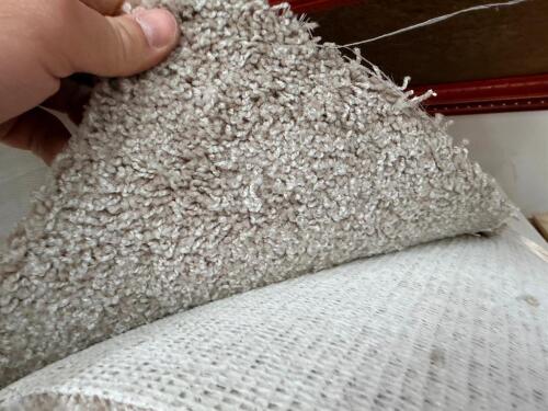 12' X 90" ROLL OF BEIGE NEUTRAL CARPET.