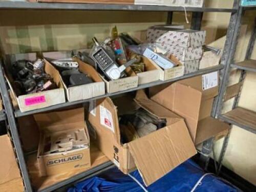 CONTENTS OF SHELF - ASSORTED DOOR HANDLE AND LOCK HARDWARE.