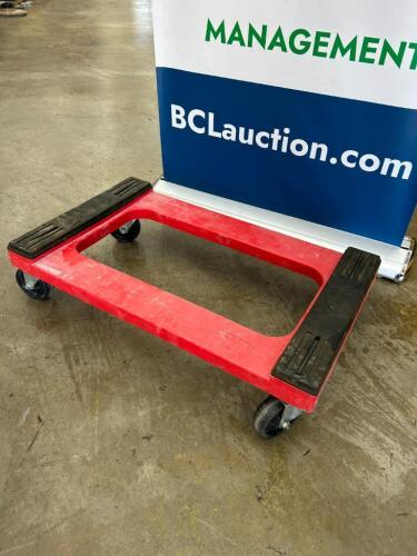 (2) RED PLASTIC HEAVY DUTY FOUR WAY DOLLYS.