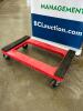 (2) RED PLASTIC HEAVY DUTY FOUR WAY DOLLYS.