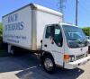 ISUZU BOX TRUCK WITH ENCLOSED CARGO BODY, WOOD FLOORING, INTERIOR SIDE RAILS, ROLL-UP REAR DOOR, TUCK-AWAY LIFTGATE (1500 LB. CAPACITY), STEEL WHEELS, CAB OVER DESIGN, CLOTH SEATS, DASH CONTROLS, ODOMETER 183,489 MILES