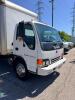 ISUZU BOX TRUCK WITH ENCLOSED CARGO BODY, WOOD FLOORING, INTERIOR SIDE RAILS, ROLL-UP REAR DOOR, TUCK-AWAY LIFTGATE (1500 LB. CAPACITY), STEEL WHEELS, CAB OVER DESIGN, CLOTH SEATS, DASH CONTROLS, ODOMETER 183,489 MILES - 2