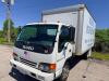 ISUZU BOX TRUCK WITH ENCLOSED CARGO BODY, WOOD FLOORING, INTERIOR SIDE RAILS, ROLL-UP REAR DOOR, TUCK-AWAY LIFTGATE (1500 LB. CAPACITY), STEEL WHEELS, CAB OVER DESIGN, CLOTH SEATS, DASH CONTROLS, ODOMETER 183,489 MILES - 4