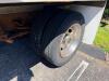 ISUZU BOX TRUCK WITH ENCLOSED CARGO BODY, WOOD FLOORING, INTERIOR SIDE RAILS, ROLL-UP REAR DOOR, TUCK-AWAY LIFTGATE (1500 LB. CAPACITY), STEEL WHEELS, CAB OVER DESIGN, CLOTH SEATS, DASH CONTROLS, ODOMETER 183,489 MILES - 5