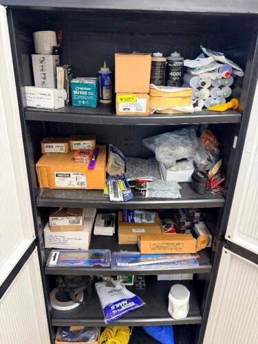 CONTENTS OF STORAGE CABINET - ASSORTMENT OF HARDWARE, SUPPLIES, AND MATERIALS.