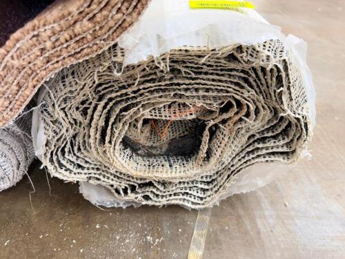 OLL OF COMMERCIAL CARPETING WITH DARK AND LIGHT FIBER MIX, LOOP PILE CONSTRUCTION WITH GRID BACKING