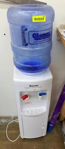 ELECTRIC WATER COOLER W/ (1) EXTRA FULL JUG OF WATER.