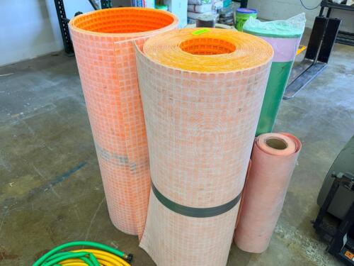 ASSORTED ROLLS OF ORANGE DITRA-STYLE UNDERLAYMENT MEMBRANE AND ASSOCIATED FLOORING UNDERLAY MATERIALS,