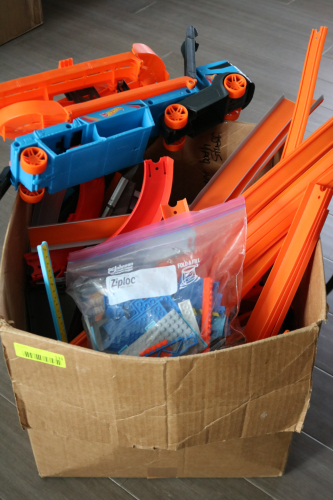 HUGE BOX HOTWHEELS TRACK BUILDER TRACK PIECES AND SEMI HAULER RAMP VEHICLE