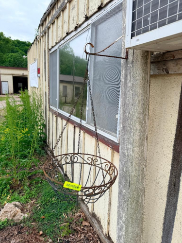 METAL HANGING PLANT BASKET AND SHOE CLEANER.
