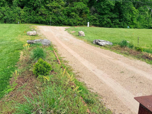 (5) ASSORTED LARGE LANDSCAPING BOULDERS