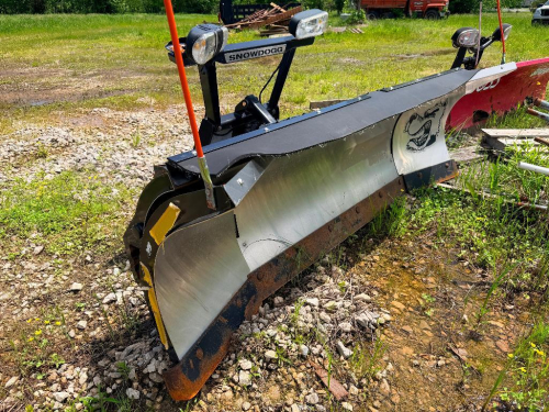 SNOWDOGG STAINLESS STEEL SNOW PLOW WITH HYDRAULIC ANGLE SYSTEM, TRUCK MOUNT ASSEMBLY, AND PLOW LIGHTS.