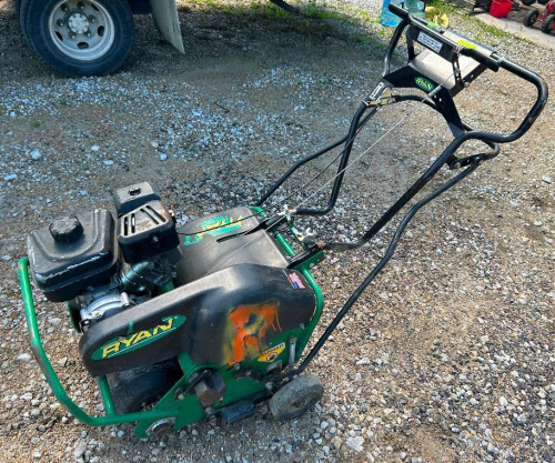 RYAN WALK-BEHIND TURF AERATOR UNIT WITH BELT-DRIVEN TINE SYSTEM, MANUAL PUSH DESIGN, STEEL FRAME WITH CONTROL HANDLE.