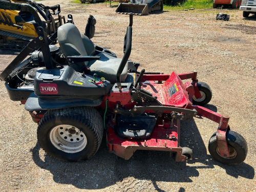 TORO ZERO TURN MOWER, SIDE DISCHARGE DECK, TWIN LEVER CONTROLS, PNEUMATIC TIRES, GAS ENGINE, SHOWING APPROX 2,924 HOURS.