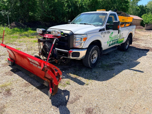 2010 FORD F-350 SUPER DUTY XL REGULAR CAB 4X4 FLATBED TRUCK WITH WESTERN SNOW PLOW. 183,680 MILES SHOWN. EQUIPPED WITH HILLSBORO FLATBED, WESTERN FRONT PLOW WITH LIGHTS, IN-CAB CONTROLLER