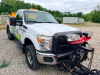 2010 FORD F-350 SUPER DUTY XL REGULAR CAB 4X4 FLATBED TRUCK WITH WESTERN SNOW PLOW. 183,680 MILES SHOWN. EQUIPPED WITH HILLSBORO FLATBED, WESTERN FRONT PLOW WITH LIGHTS, IN-CAB CONTROLLER - 13