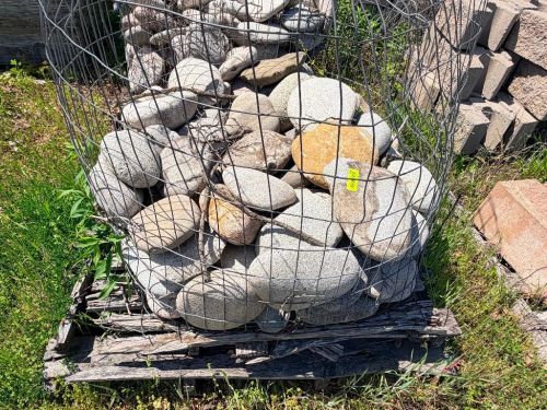 (3) PALLETS OF LARGE RIVER BED ROCKS.