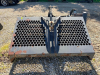 INGERSOLL RAND SKID STEER LANDSCAPE RAKE ATTACHMENT WITH HYDRAULIC ANGLE ADJUSTMENT, FULL WIDTH DRUM WITH CARBIDE TEETH, AND PERFORATED TOP SCREEN. FEATURES QUICK ATTACH MOUNT, SIDE PLATES, AND HYDRAULIC MOTOR DRIVE. - 2