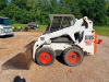 BOBCAT SKID STEER LOADER WITH ENCLOSED CAB, FRONT BUCKET ATTACHMENT, AND HAND/FOOT CONTROLS. - 10
