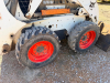 BOBCAT SKID STEER LOADER WITH ENCLOSED CAB, FRONT BUCKET ATTACHMENT, AND HAND/FOOT CONTROLS. - 12