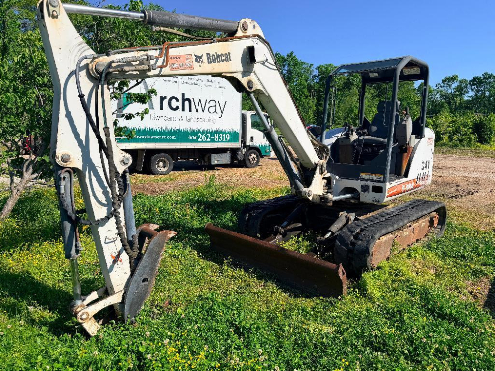 BOBCAT COMPACT EXCAVATOR WITH OPEN CAB, RUBBER TRACKS, FRONT BLADE, AND ...