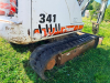 BOBCAT COMPACT EXCAVATOR WITH OPEN CAB, RUBBER TRACKS, FRONT BLADE, AND BUCKET ATTACHMENT. - 4
