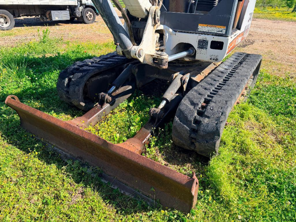 BOBCAT COMPACT EXCAVATOR WITH OPEN CAB, RUBBER TRACKS, FRONT BLADE, AND ...