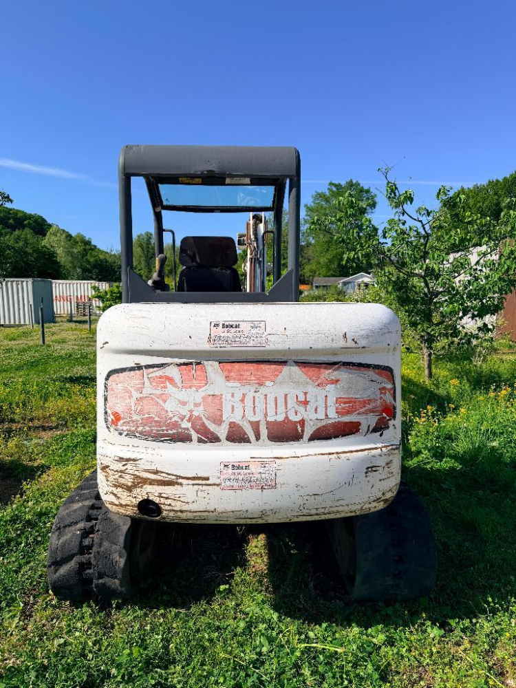 BOBCAT COMPACT EXCAVATOR WITH OPEN CAB, RUBBER TRACKS, FRONT BLADE, AND ...