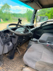 2012 ISUZU CAB OVER BOX TRUCK WITH ENCLOSED CARGO BODY, ROLL-UP REAR DOOR, AND REAR RAMP GATE. UNIT - 5