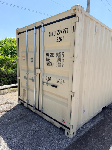 20FT STEEL SHIPPING STORAGE CONTAINER WITH DOUBLE SWING LOCKING DOORS, CORRUGATED STEEL SIDEWALLS, MARINE GRADE PLYWOOD FLOORING, AND CSC SAFETY APPROVAL PLATE. UNIT FEATURES 33.2 CUBIC METER CAPACITY AND HEAVY-DUTY STEEL CONSTRUCTION.