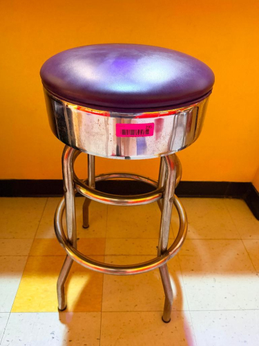 (2) RETRO-STYLE COMMERCIAL BAR STOOL WITH PADDED PURPLE VINYL SEAT.