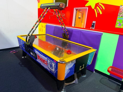 ICE &ldquo;FAST TRACK&rdquo; COMMERCIAL AIR HOCKEY TABLE ARCADE GAME WITH OVERHEAD ELECTRONIC SCOREBOARD, COIN-OPERATED CABINET, AND DUAL MALLETS / PUCKS.