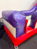 COMMERCIAL INFLATABLE 18 FT SLIDE WITH BLOWER AND ROUND MULTI-LEVEL CLIMBING PLAY STRUCTURE. INCLUDES INFLATABLE SLIDE, BLOWER FAN, METAL FRAME PLAY TOWER, NETTING, AND PADDED SUPPORTS. DISASSEMBLY REQUIRED. - 3