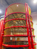 COMMERCIAL INFLATABLE 18 FT SLIDE WITH BLOWER AND ROUND MULTI-LEVEL CLIMBING PLAY STRUCTURE. INCLUDES INFLATABLE SLIDE, BLOWER FAN, METAL FRAME PLAY TOWER, NETTING, AND PADDED SUPPORTS. DISASSEMBLY REQUIRED. - 16