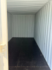 NEW 20FT STEEL SHIPPING CONTAINER WITH LOCKING DOUBLE DOORS, CORRUGATED STEEL CONSTRUCTION, WOOD FLOORING, AND CSC SAFETY APPROVAL. UNIT FEATURES CLEAN INTERIOR CONDITION AND WEATHER-RESISTANT EXTERIOR FINISH. - 6