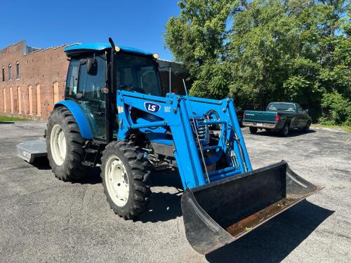 LS MTRON XU6158 CAB TRACTOR WITH FRONT END LOADER WITH BUCKET. DIESEL POWERED TRACTOR EQUIPPED WITH ENCLOSED CAB, HVAC CONTROLS, MULTIPLE HYDRAULIC CONTROLS, PTO, 4WD SELECTOR, REAR HYDRAULIC CONNECTIONS, AND LS LL5106 FRONT LOADER. HOUR METER SHOWS 198.0