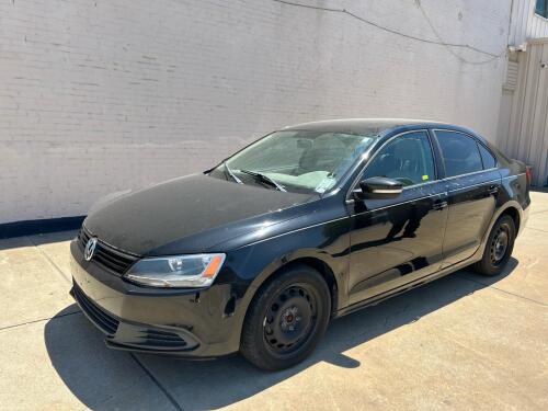 BLACK VOLKSWAGEN JETTA SEDAN