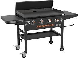 (1) HARD TOP GRIDDLE WITH COVER AND FOLDING SHELVES